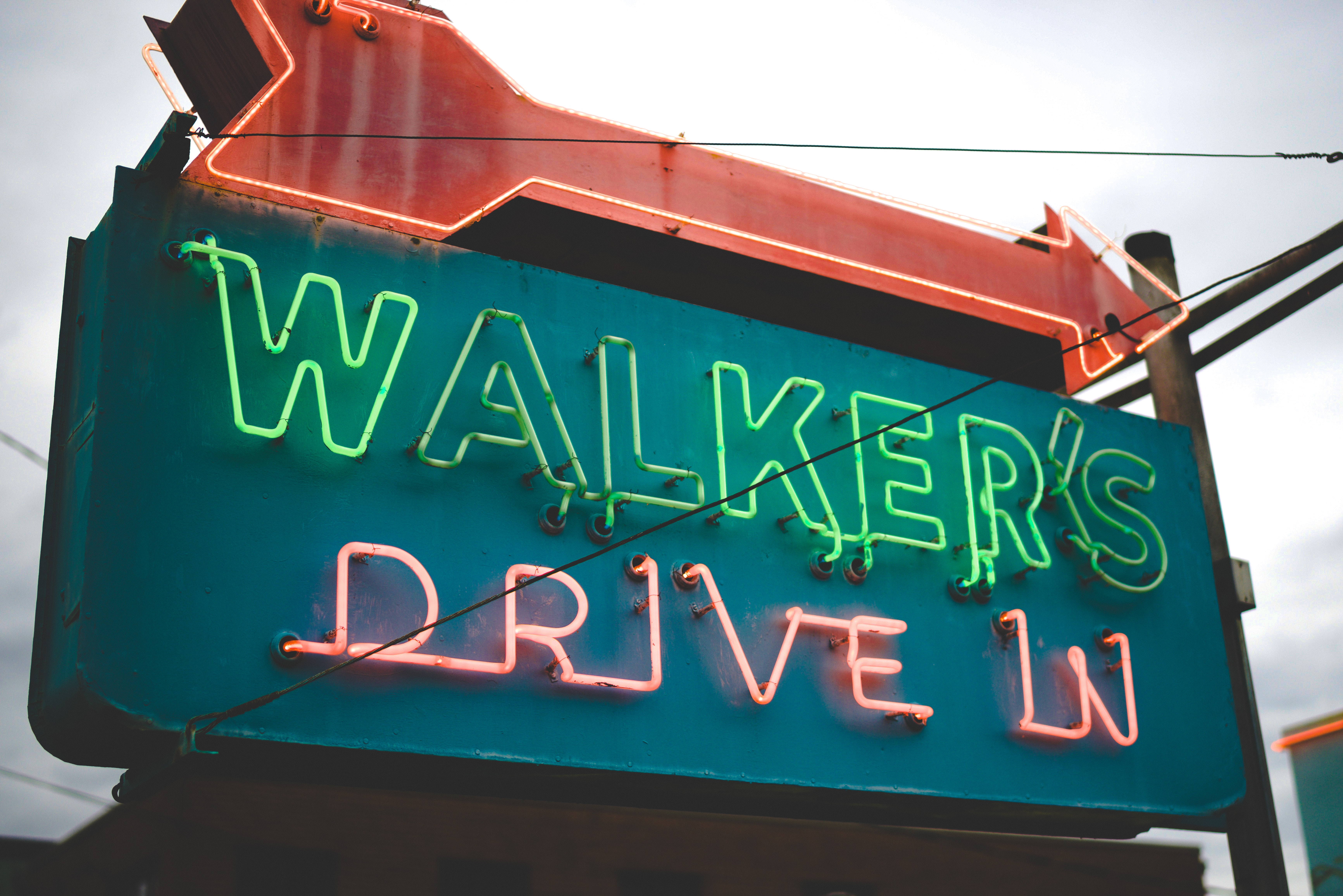 neo sign that says walker's drive in